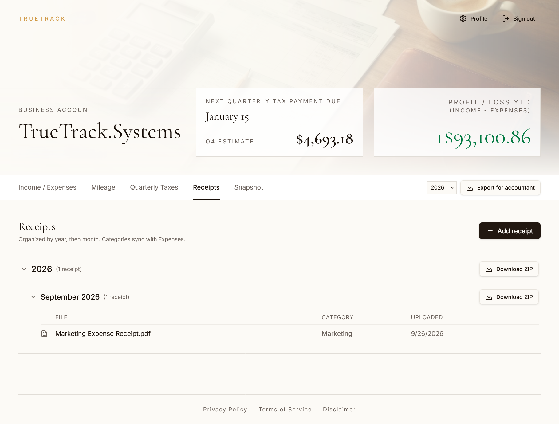 TrueTrack receipts vault showing uploaded receipts organized by month with download options